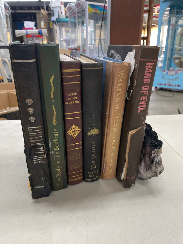 Evil Hand Book Stack