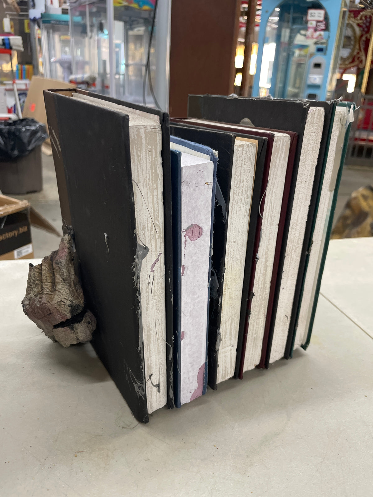 Evil Hand Book Stack